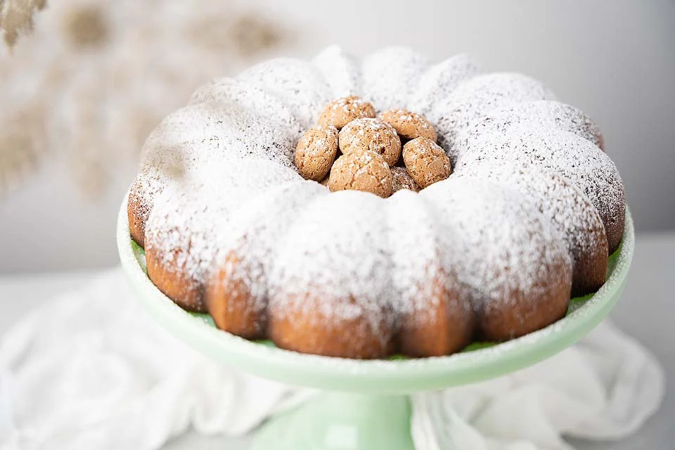 A bakery-fresh bundt cake sprinkled with delicate powdered sugar.