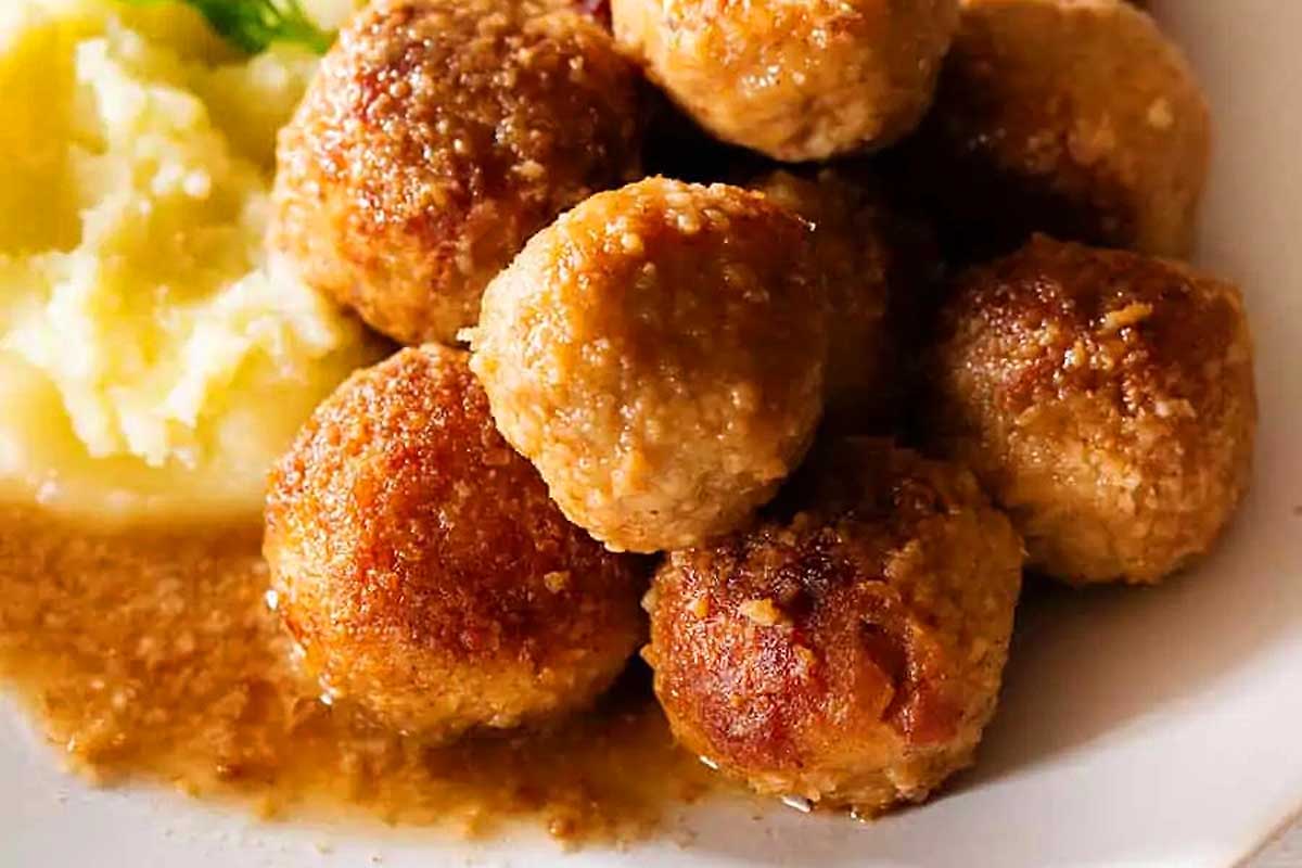 Italian Appetizer featuring Swedish meatballs with mashed potatoes and gravy.