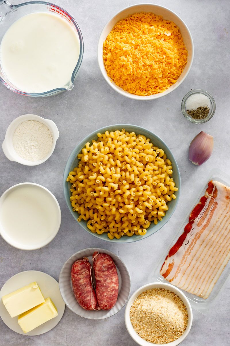 The loaded ingredients for a corn chowder are laid out on a table.