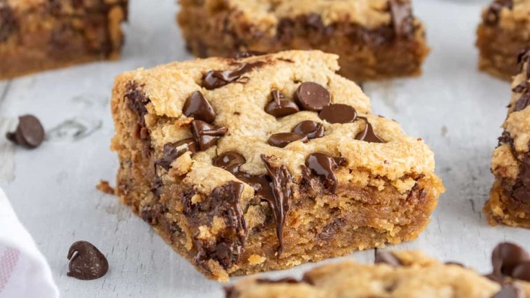 Peanut butter chocolate chip bars on a white background.