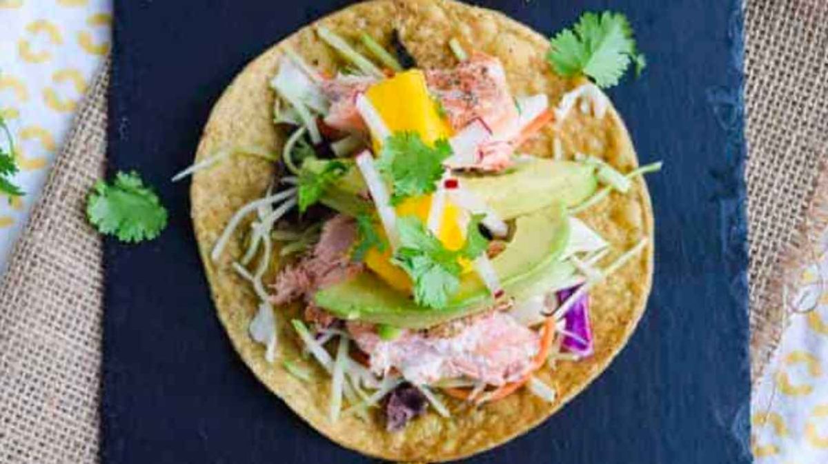 Salmon tostadas with avocado.