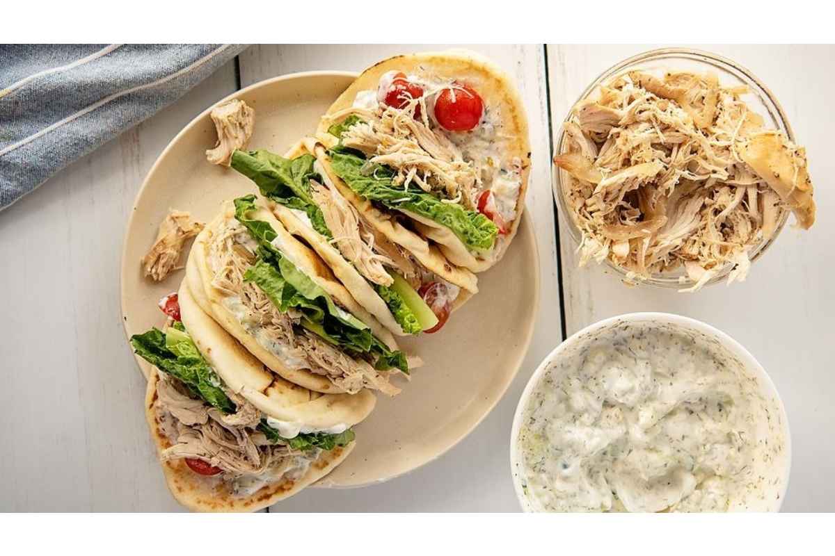 Greek chicken pitas with tzatziki sauce are a nutritious and satisfying lunch option packed with high protein.