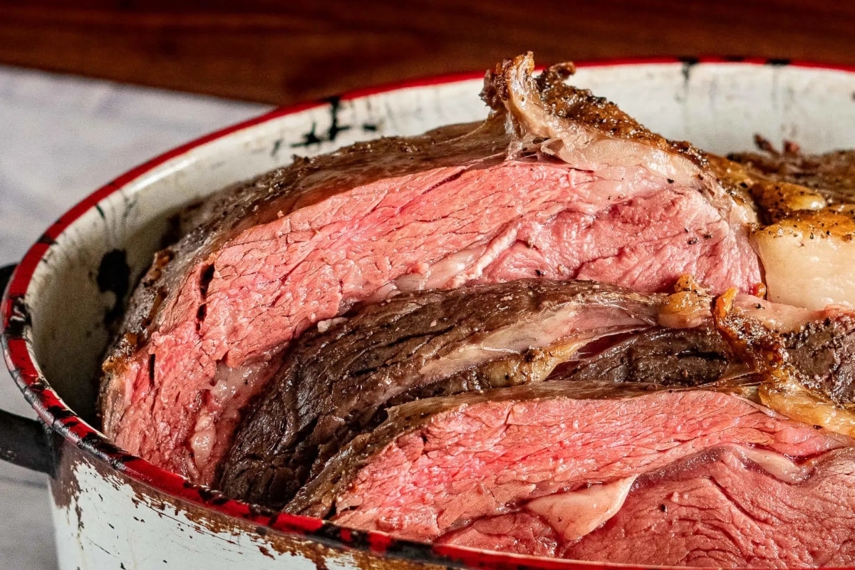 Simple roast beef in an elegant pot on a table.