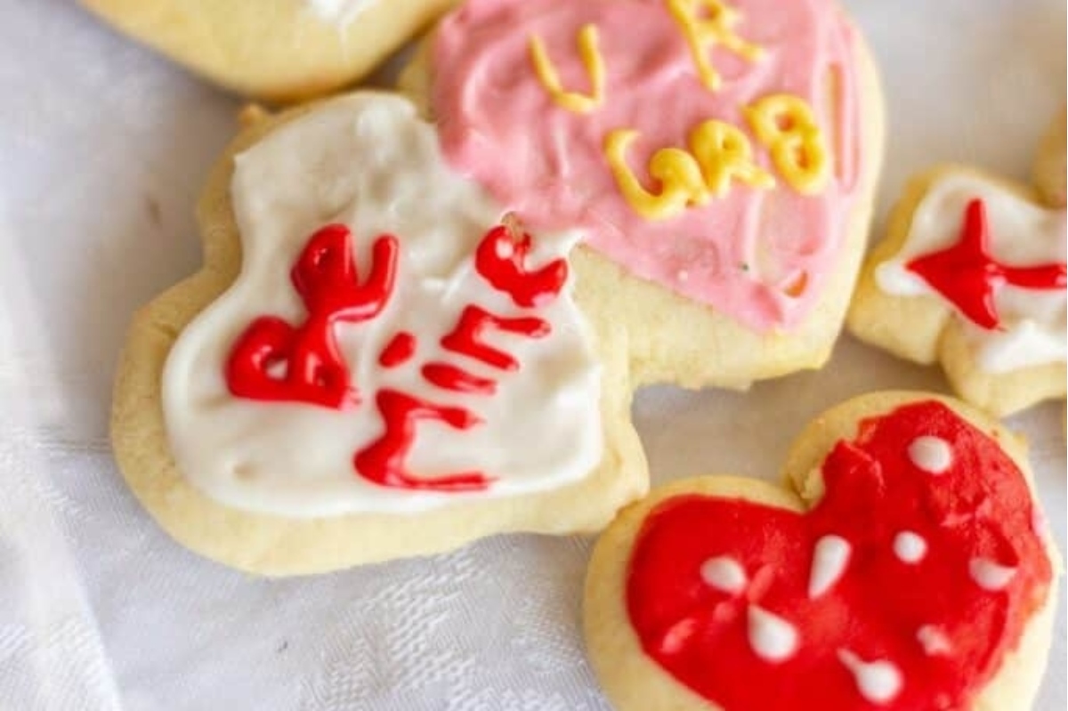 Valentine's Day cookies on a white table.