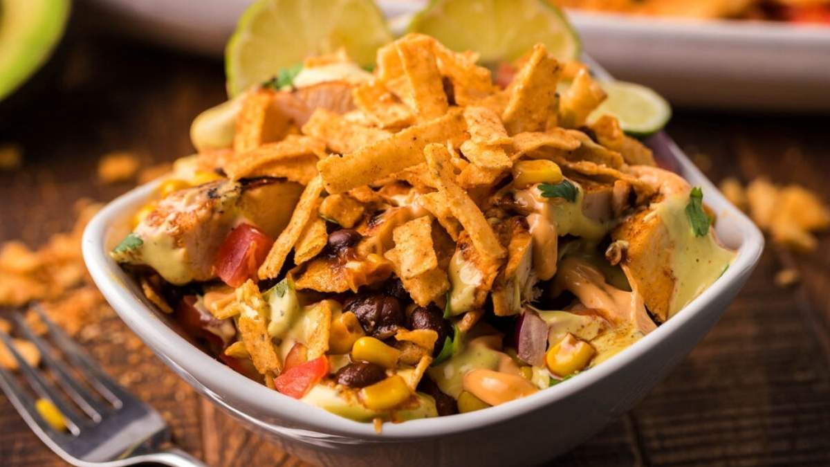 Mexican chicken salad in a white bowl.