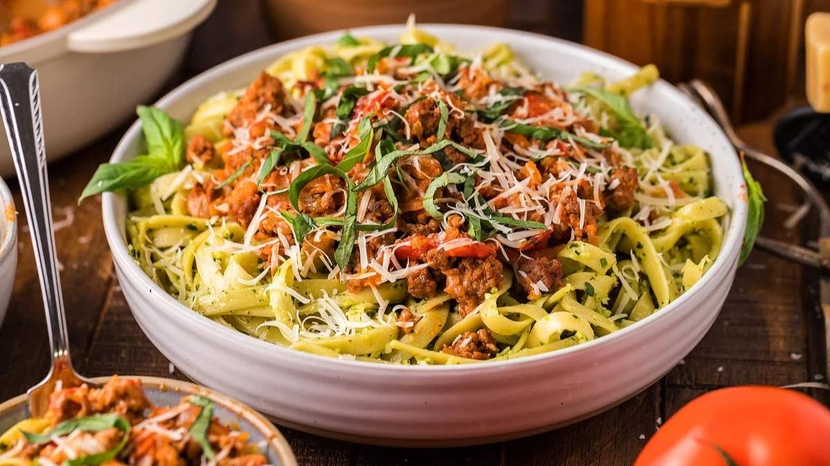 Pesto Fettuccini With Bolognese Sauce.