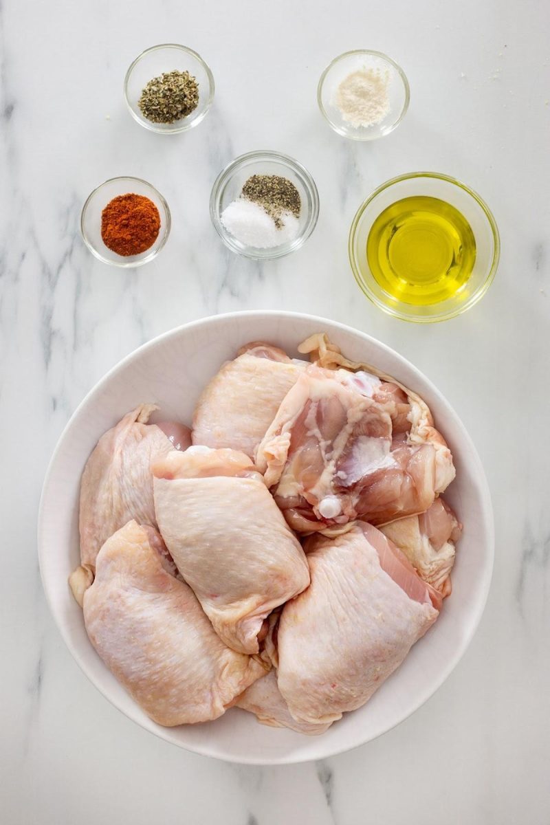 Grilled chicken thigh ingredients on a counter.