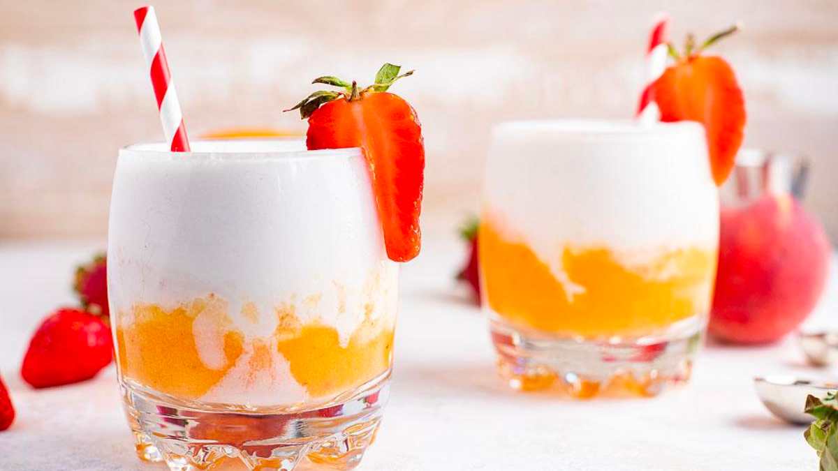 Layered Coconut Mango Tropical Rum Slushie.