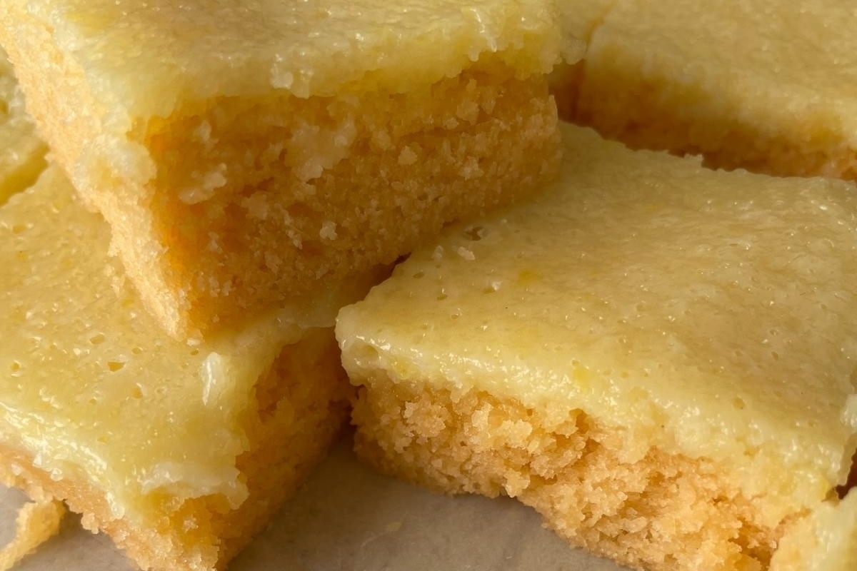Lemon bars on a white plate.