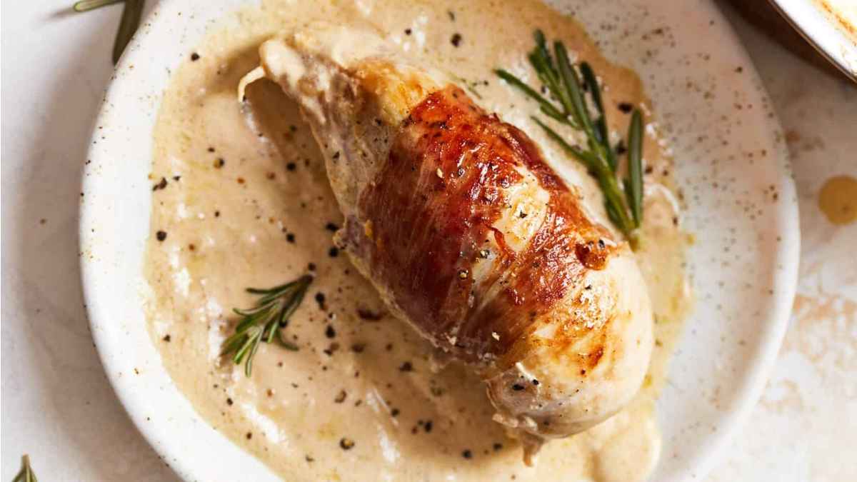 Prosciutto Wrapped Chicken In Sherry Cream Sauce.