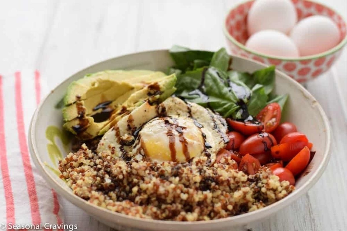 Quinoa Breakfast Bowl With Egg Tomatoes And Avocado
