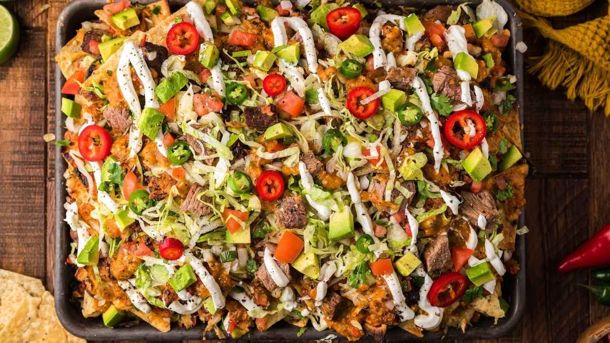 Seared Steak Nachos With Tomatillo Serrano Salsa.