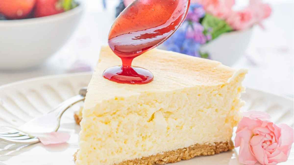 Sesame Cheesecake With Plum Coulis.