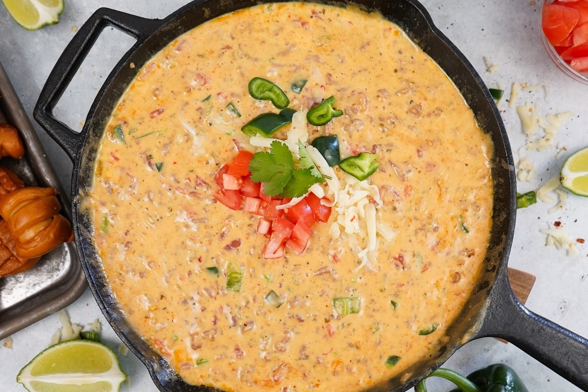 Mexican cheese dip in a skillet.