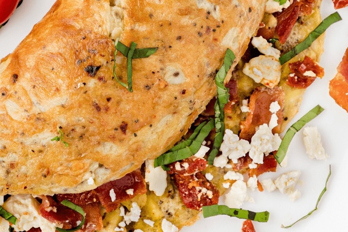 The Best Bacon Omelet Recipe With Sun dried Tomatoes Basil and Feta Cheese