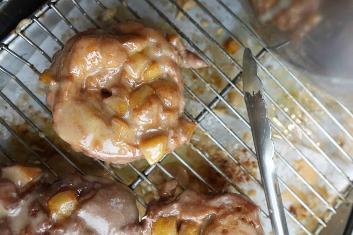The doughnuts are on a cooling rack.