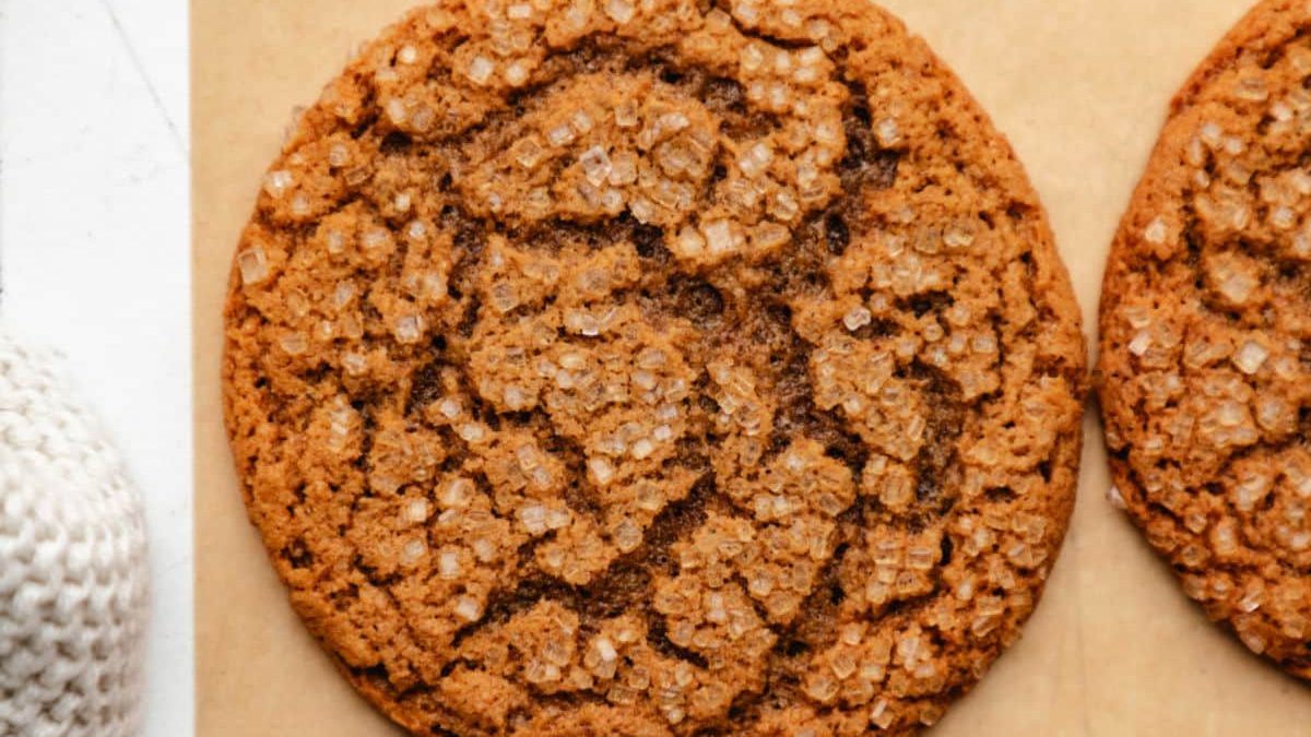 ginger molasses cookies on parchment paper.