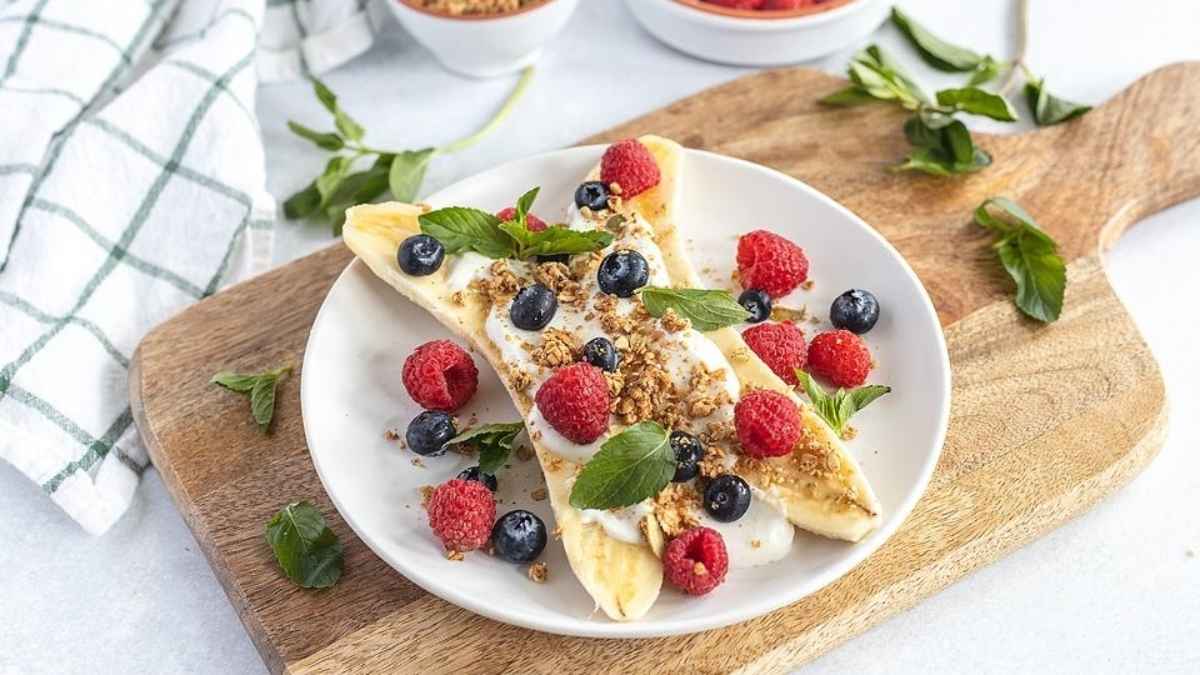 Healthy Breakfast Banana Split With Berries.