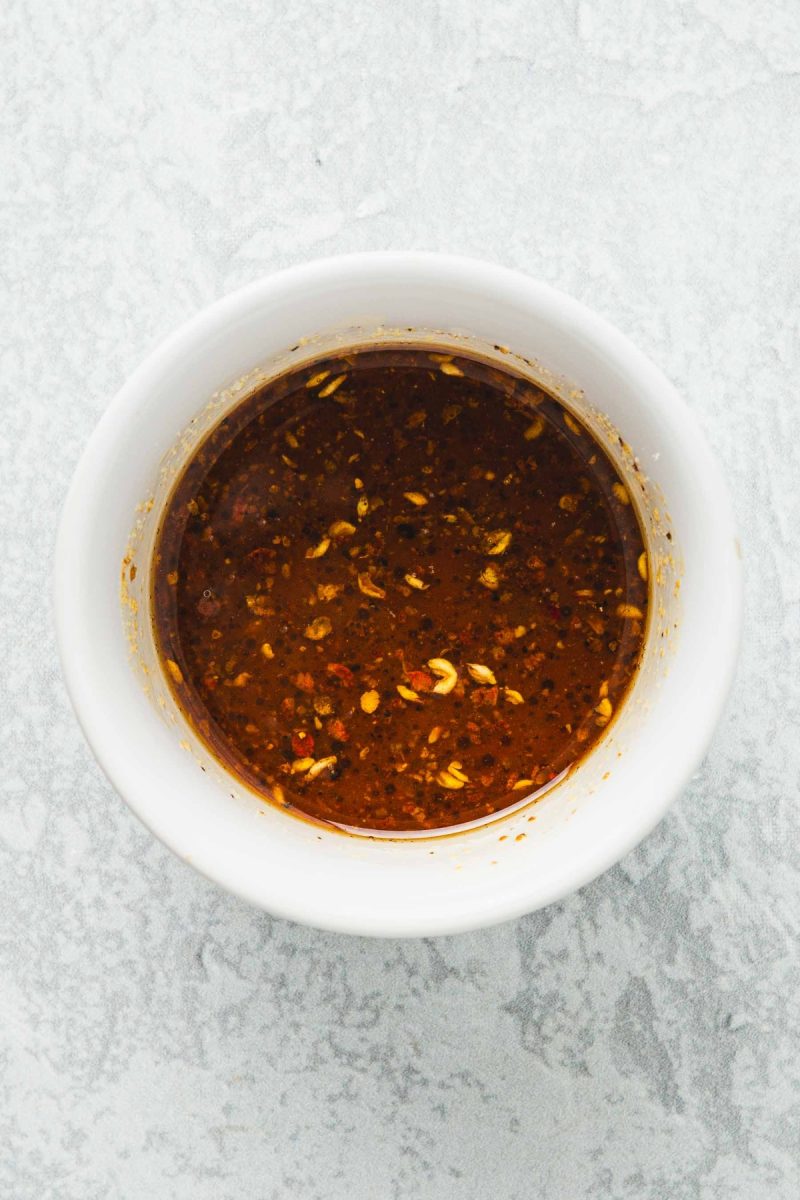 A bowl of kung pao sauce.