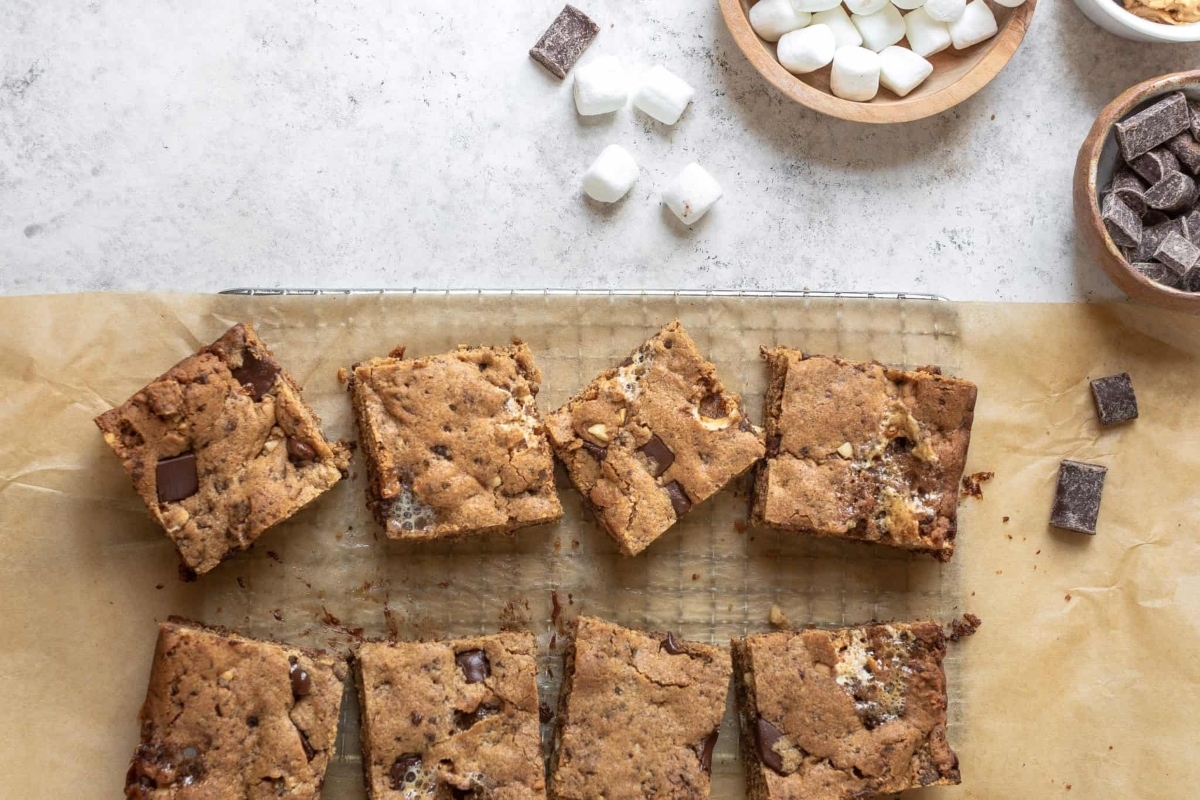 Graham cracker s'mores bars on a cutting board.