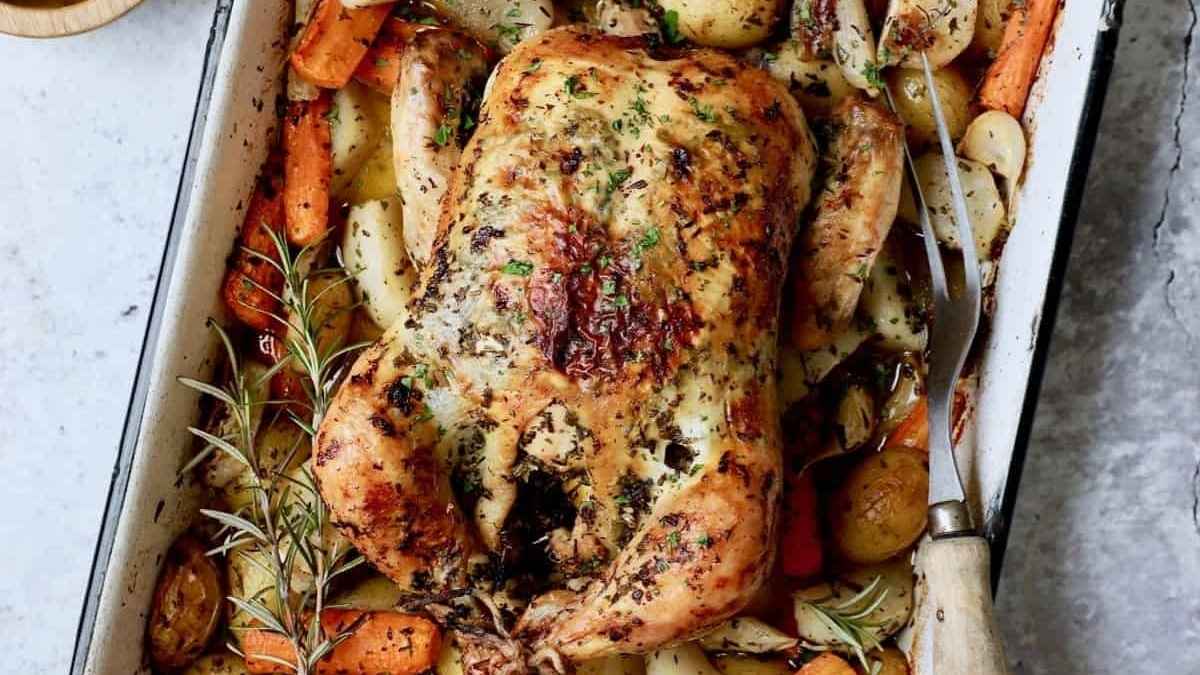 Garlic Herb Butter Roast Chicken with Root Vegetables. 