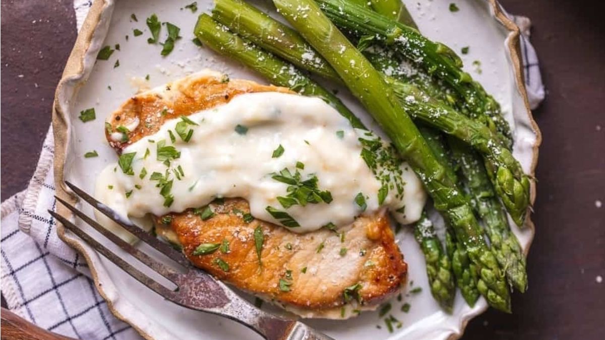 Parmesan Pork Chops With Creamy Parmesan Garlic Sauce Recipe.