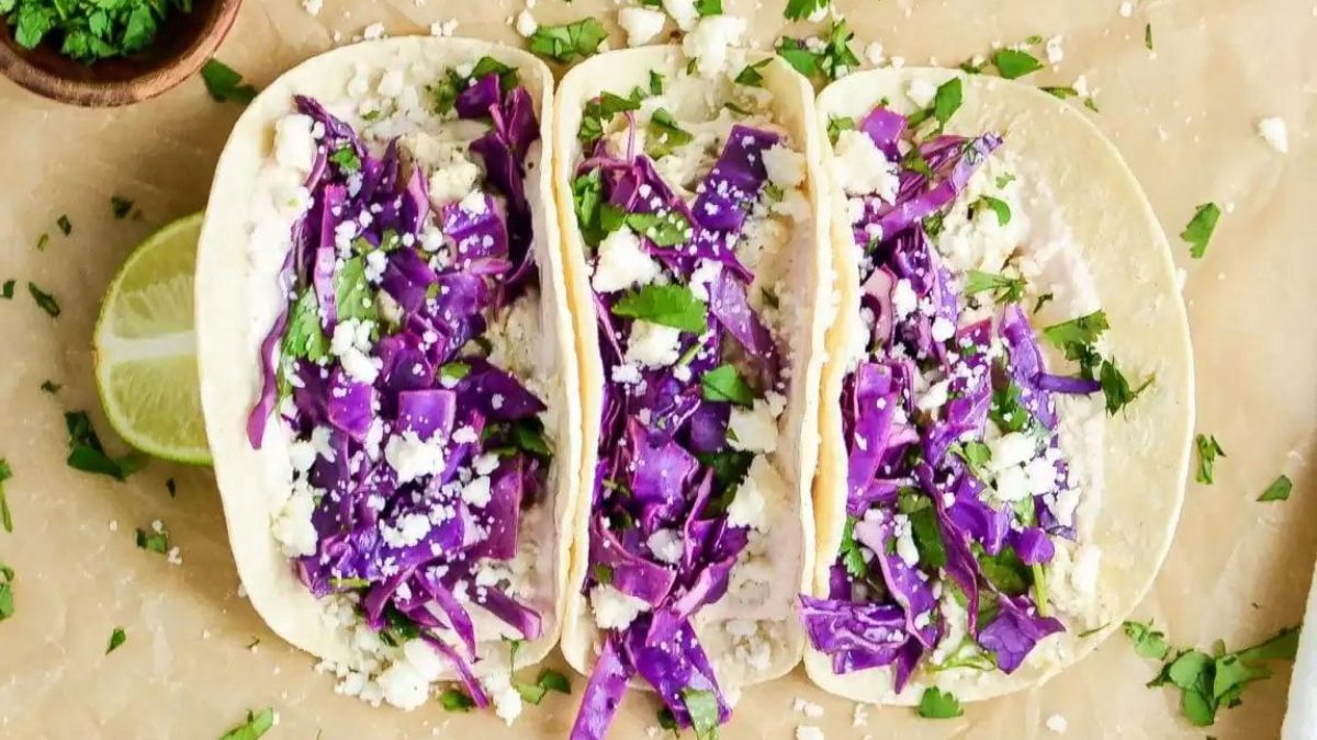 Three salsa verde chicken tacos.