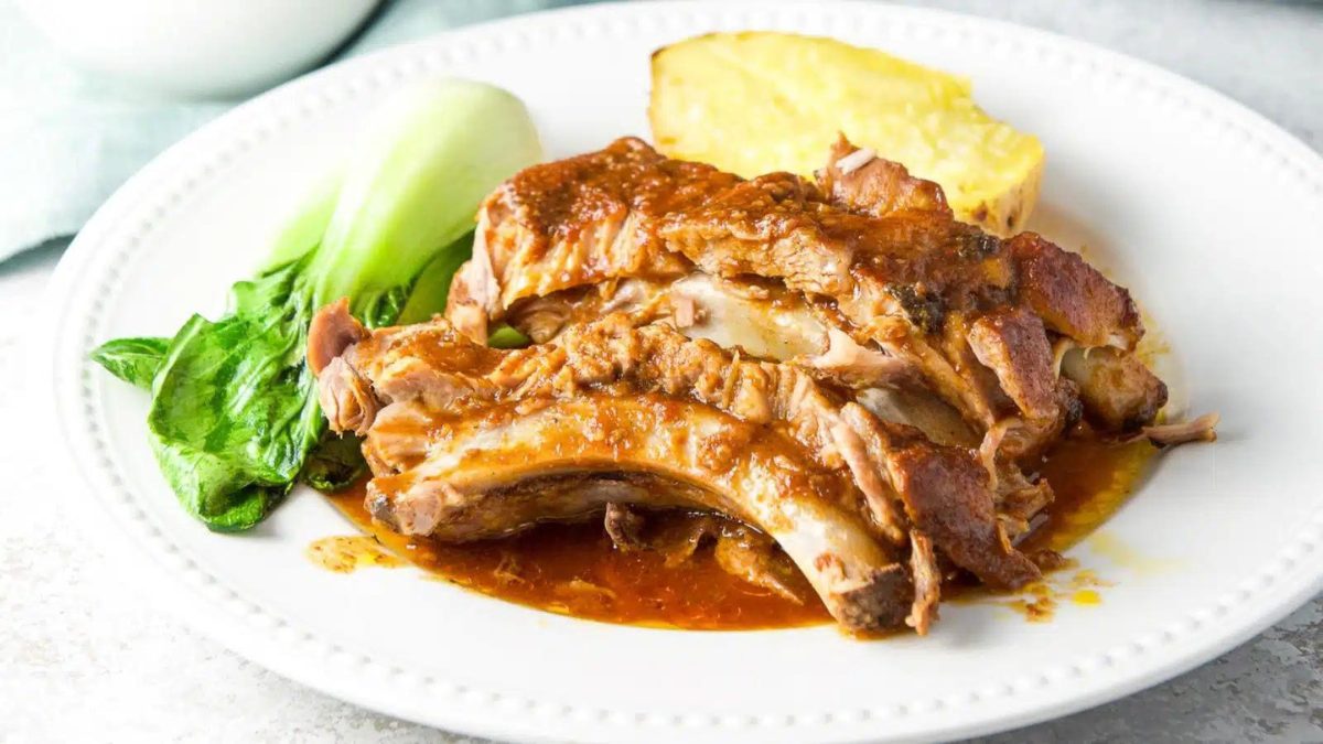 Bourbon bbq ribs on a white plate.