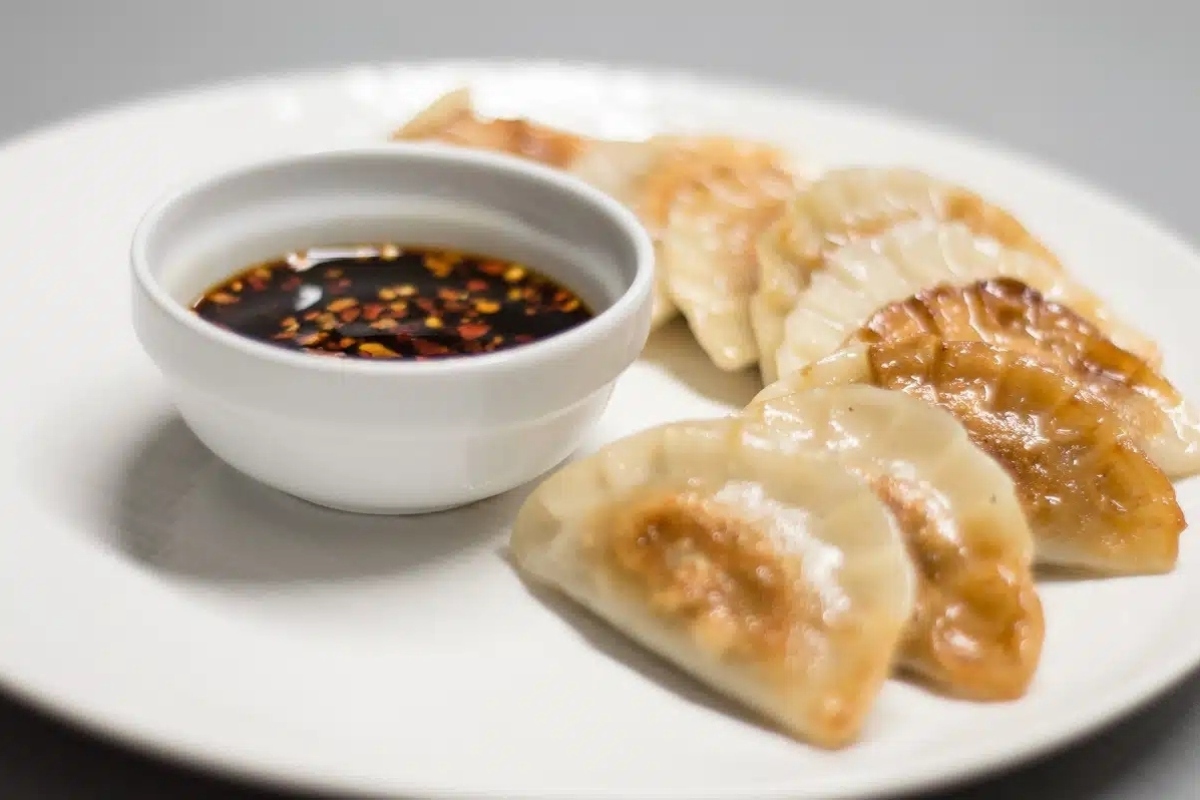 A plate of food with sauce.