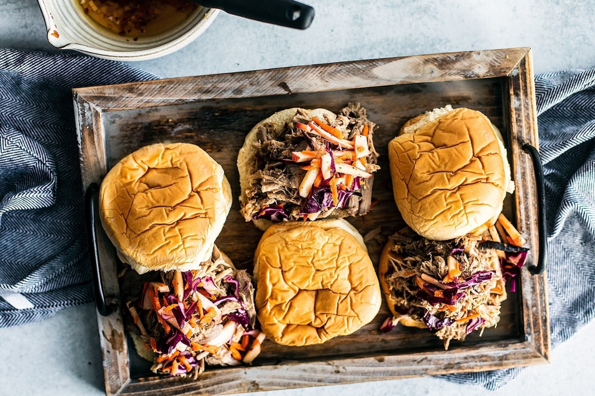Slow Cooker Pulled Pork With Tangy Apple Slaw.
