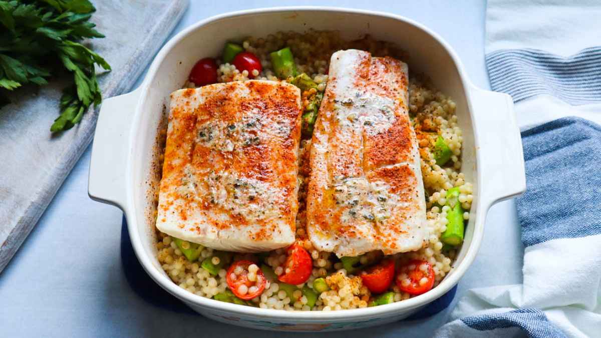 Baked Lemon Butter Halibut With Couscous And Asparagus. 