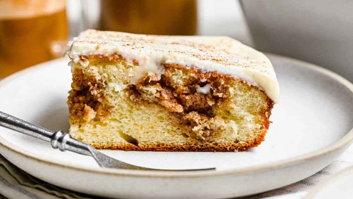 Cinnamon Roll Poke Cake. 