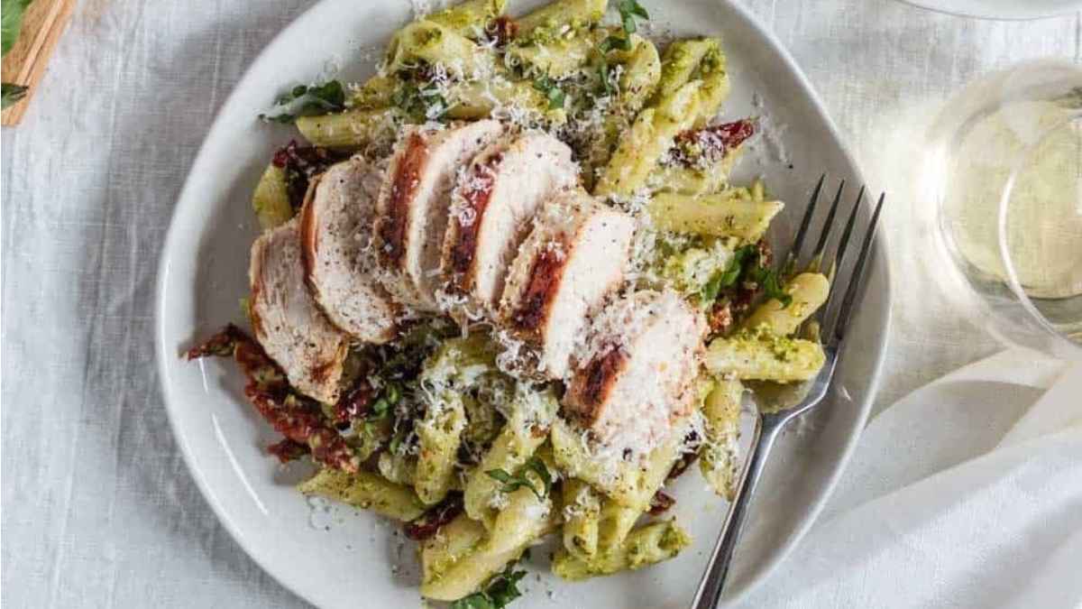 Creamy Pesto Pasta With Chicken & Sun-Dried Tomatoes.