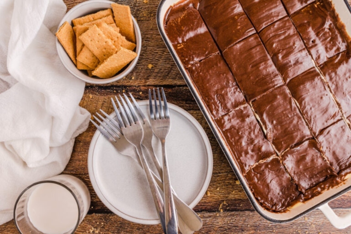 Chocolate graham cracker bars on a wooden table.