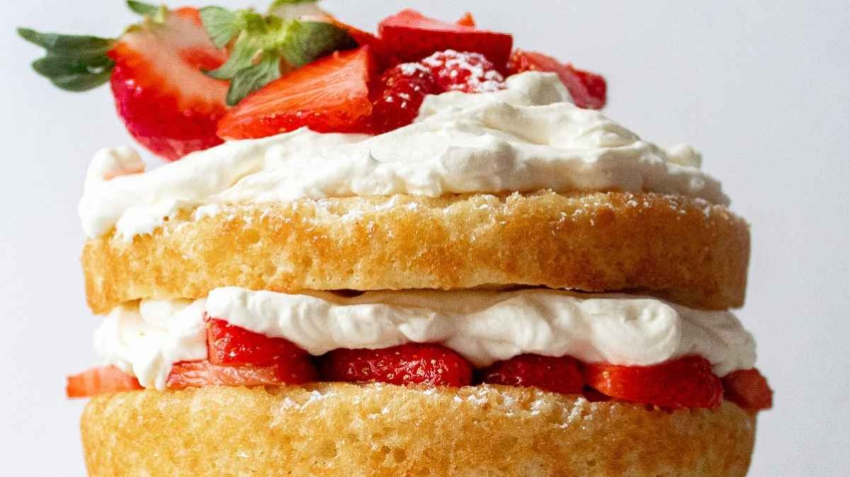 Vanilla Cake With Strawberries And Whipped Cream. 