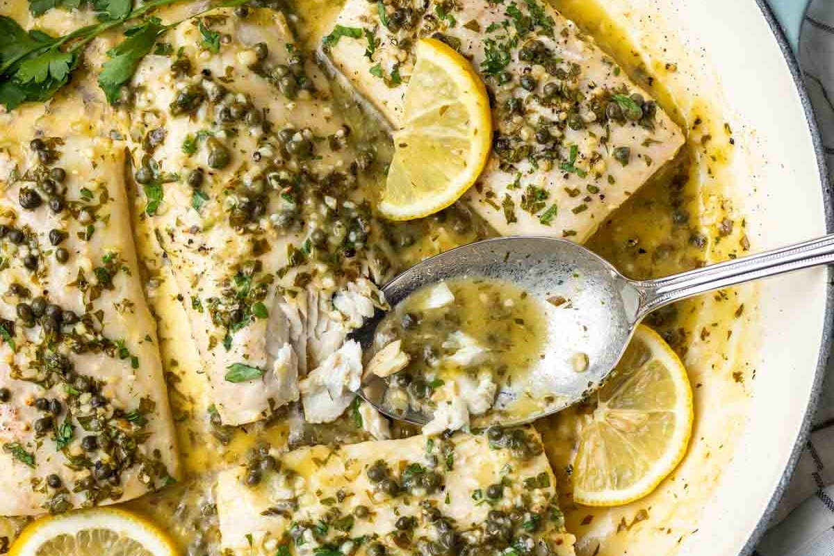 Grilled fish fillets in a lemon and caper sauce.