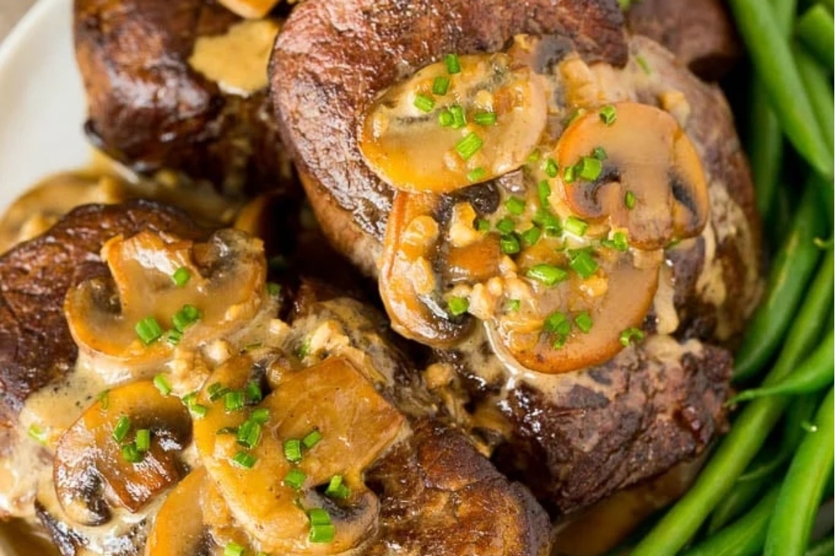 A close up of steak diane.