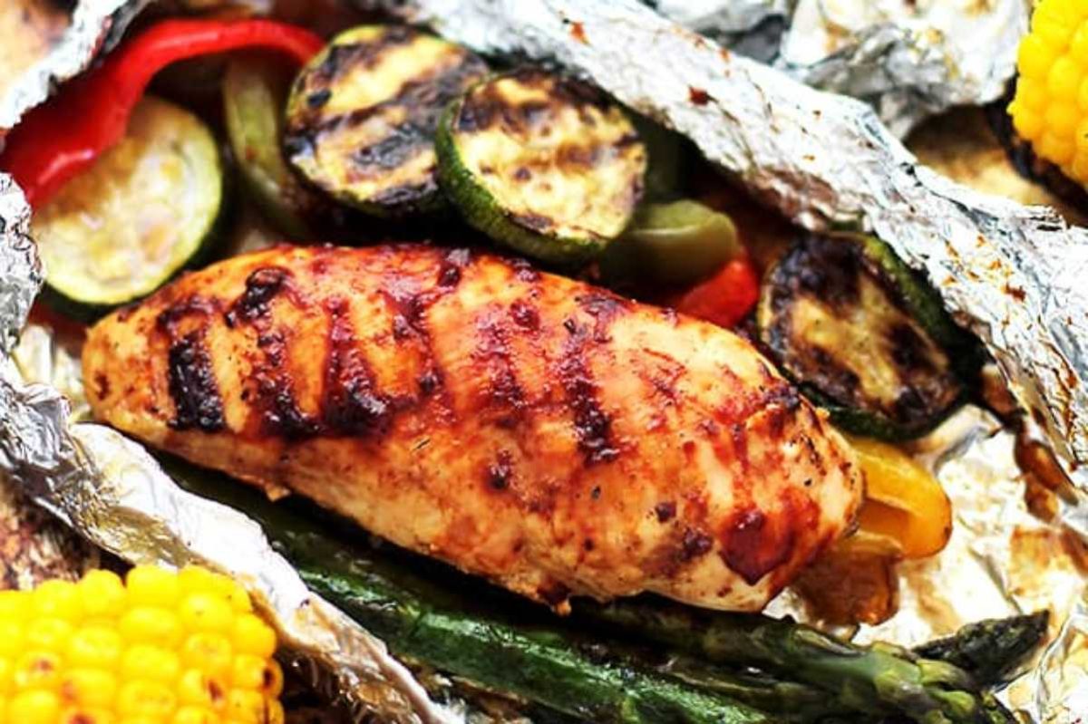 Grilled Barbecue Chicken and Vegetable Foil Packs. 