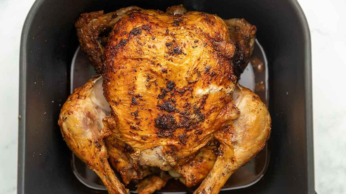 Juicy Air Fryer Whole Chicken with Crispy Skin. 