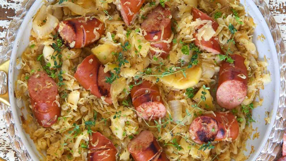 Kielbasa And Sauerkraut With Apples And Caramelized Onions. 