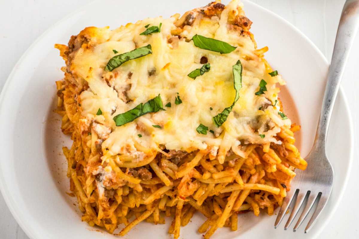 The Best Cheesy Baked Spaghetti Casserole With Meat Sauce. 
