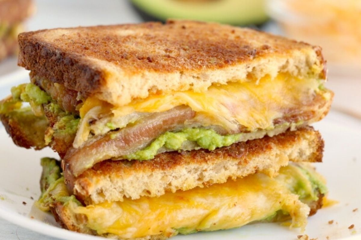 Two halves on grilled cheese sandwich on top of each other.