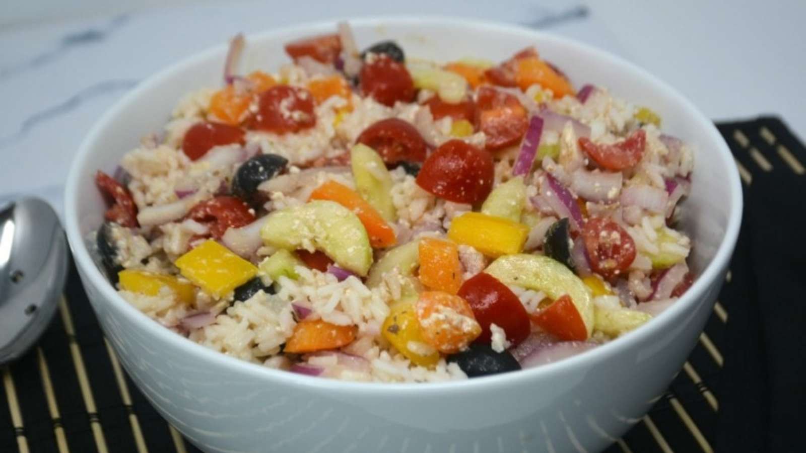 Best Greek Rice Salad recipe by Kitchen Divas.