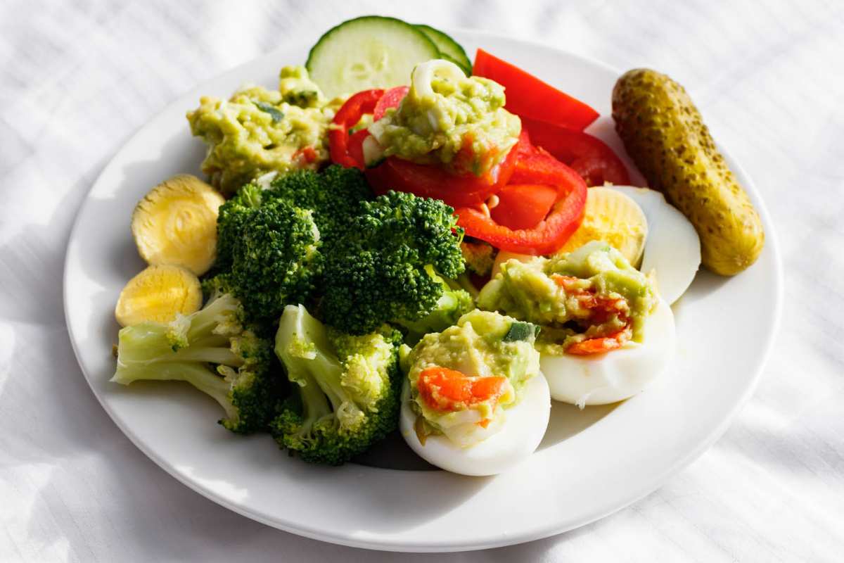 Messy Avocado Eggs Veggies Plate.