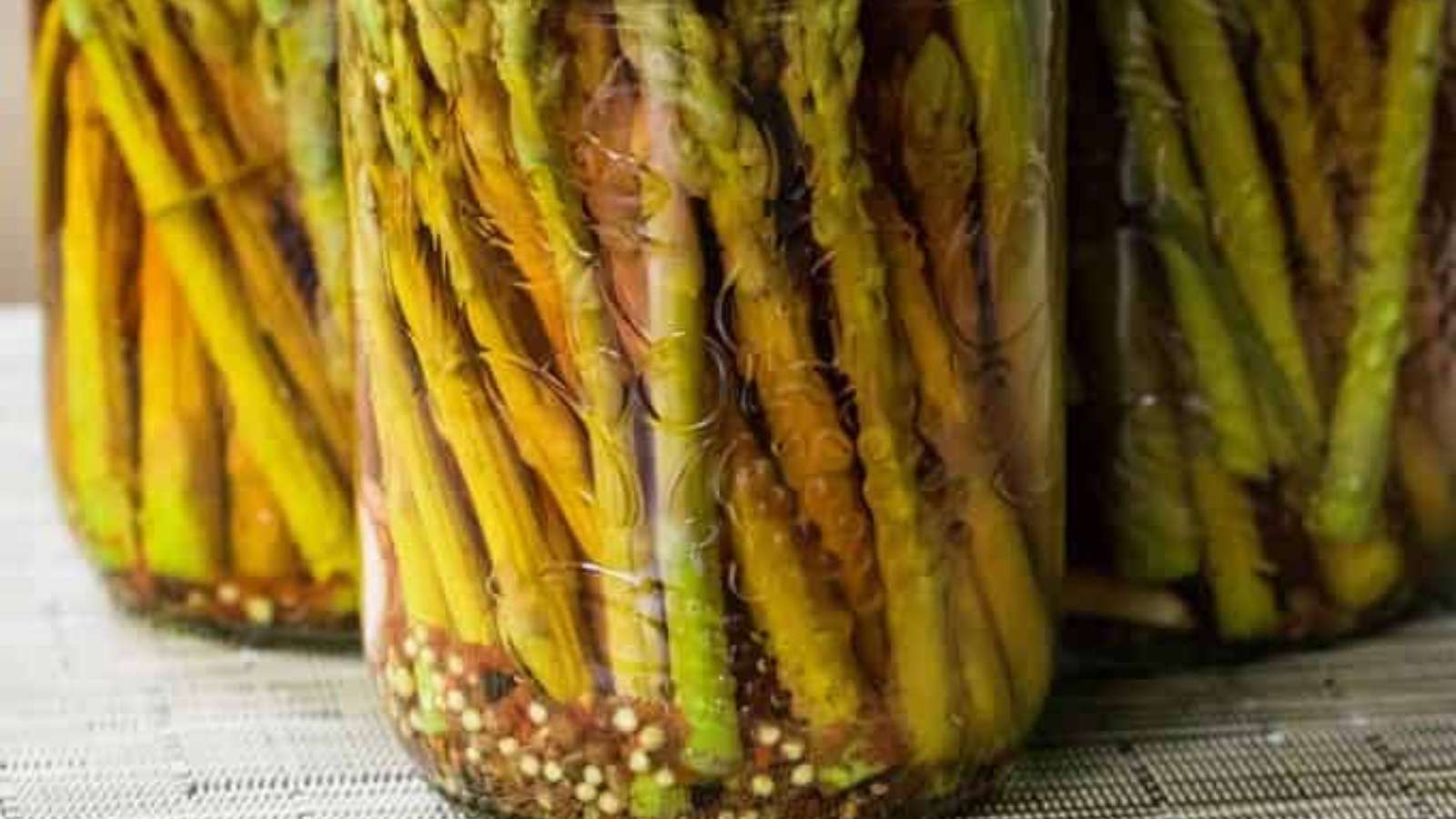 Spicy Pickled Asparagus recipe by Noshing With The Nolands.