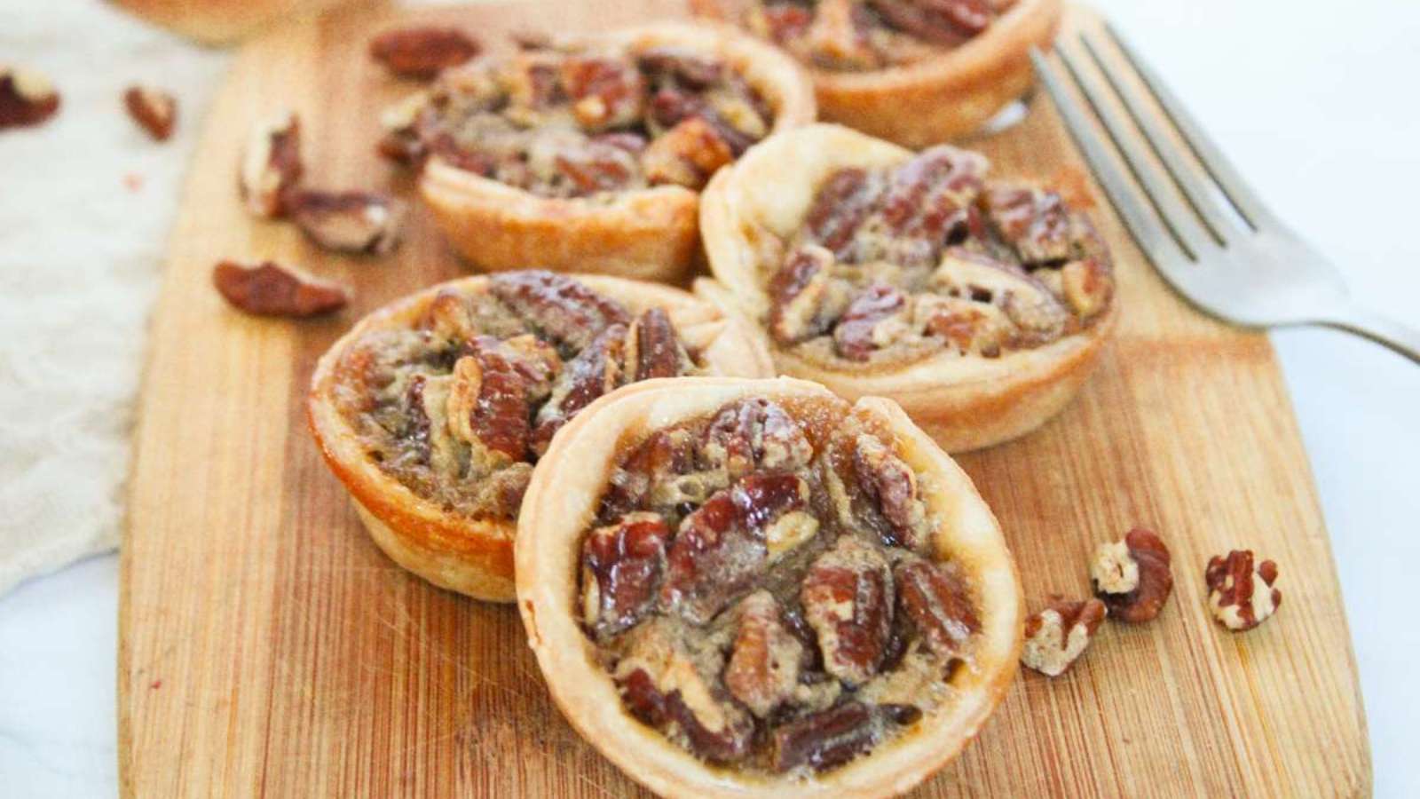 Easy Mini Pecan Pies recipe by Two Kids and a Coupon.