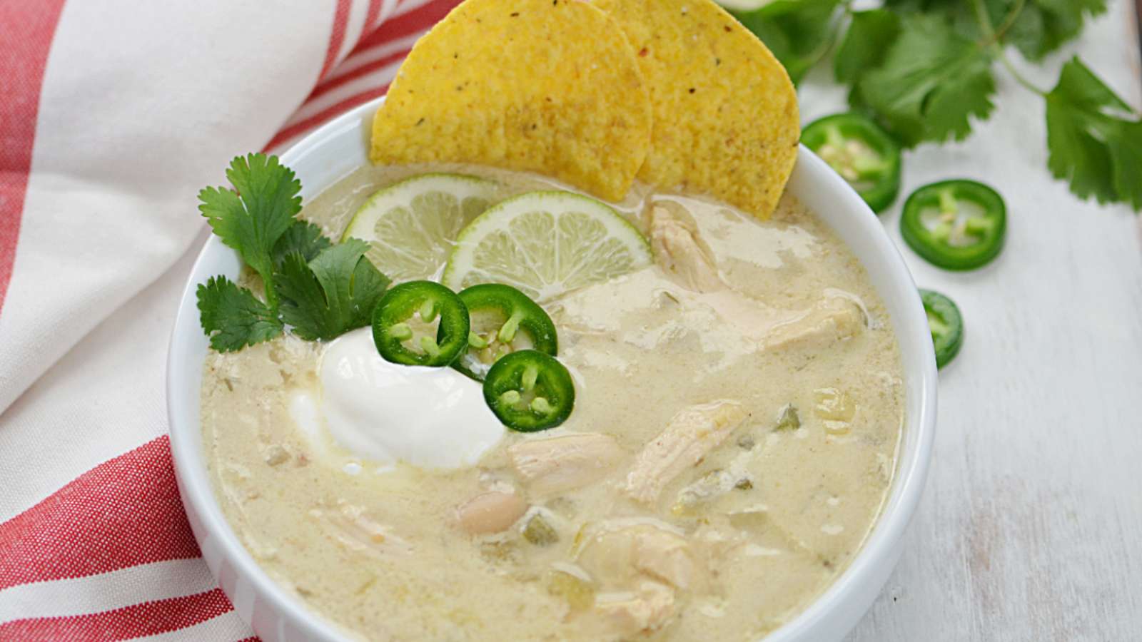 Green Chili Chicken Soup recipe by Finding Zest.