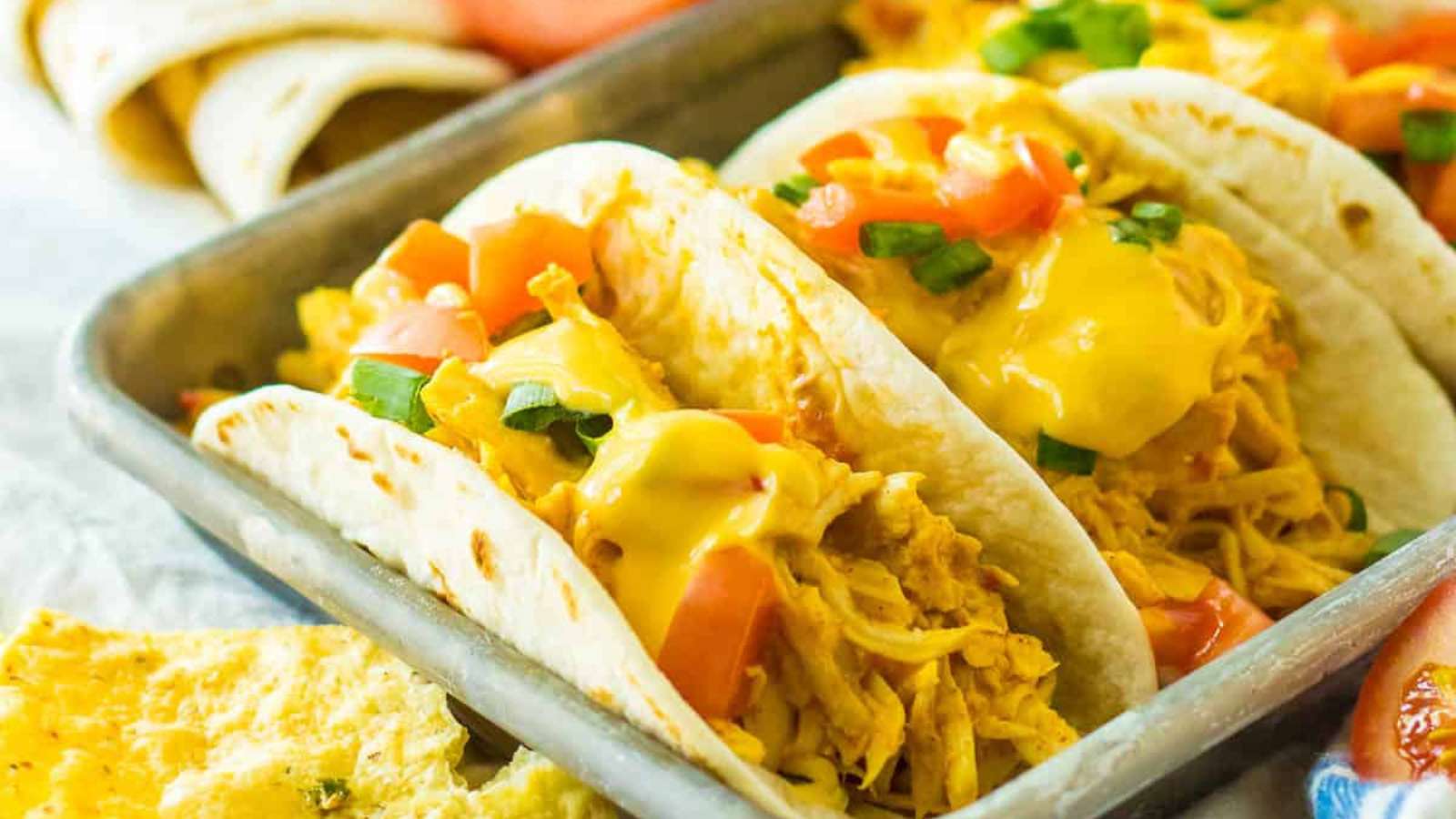 Slow Cooker Queso Chicken recipe by Busy Day Dinners.