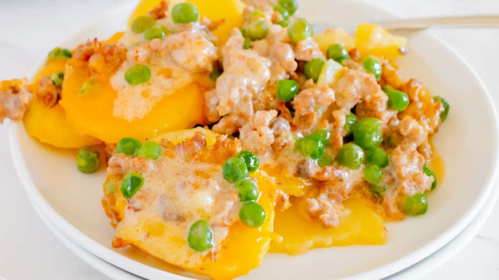 Cheesy Sausage Potato Casserole recipe by Kitchen Divas.