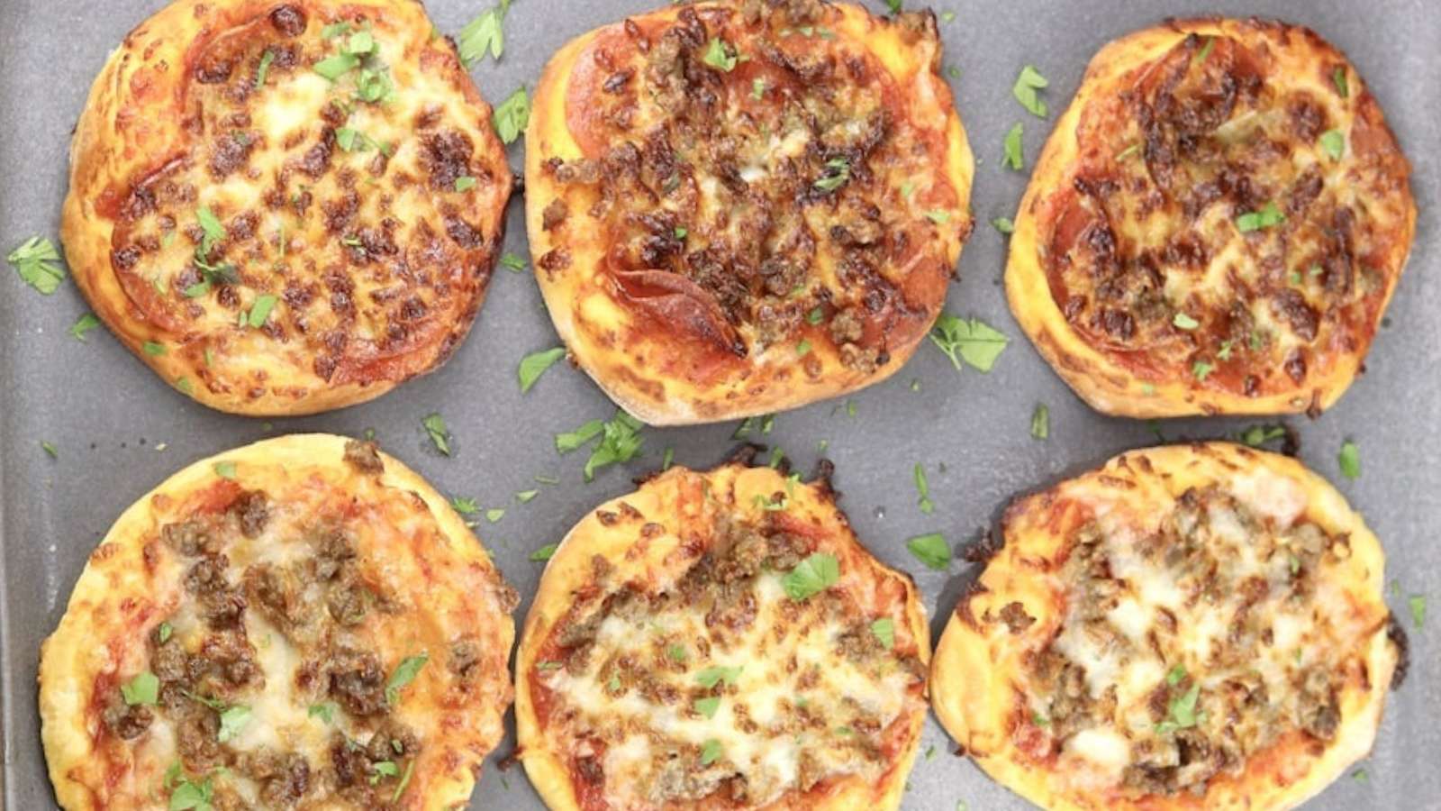Air Fryer Mini Pizzas recipe by Miss in the Kitchen.